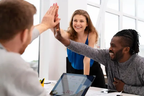 Workers High Five Close Up Photo